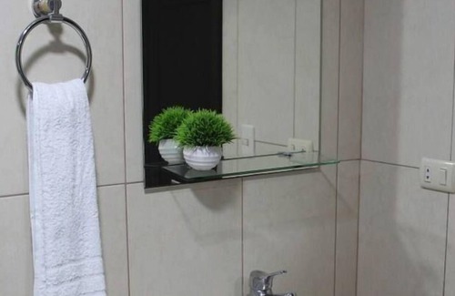 Tarqui Apartment | Comfortable, elegant suite in Puerto Santa Ana, Guayaquil.