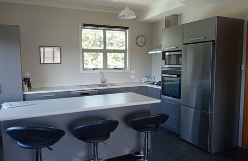 Oamaru House | Comfortable family home with beautiful wild gardens to enjoy.
