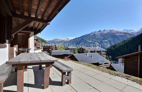 Grimentz Apartment | Comfortable flat for 5 to 6 people, living room with wood-burner and 1 divan bed, kitchen area with