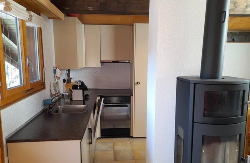 Grimentz Apartment | Comfortable flat for 7 people, living room with wood-burner, kitchen area with dishwasher, 1 double