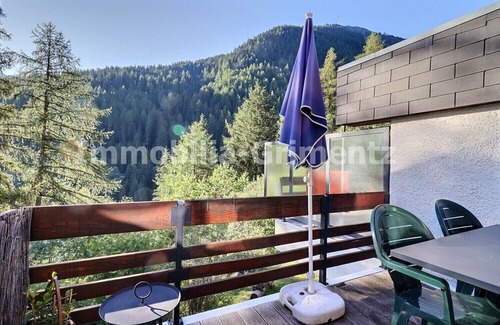 Grimentz Apartment | Comfortable flat on 2 levels for 6 people, living room with wood-burner, kitchen area with dishwashe