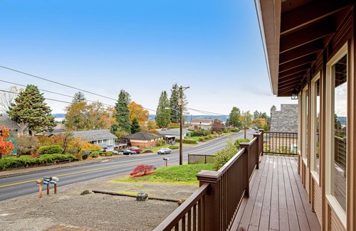 University Place House | Comfortable home with Puget Sound view, decks, garden patio, WiFi & W/D