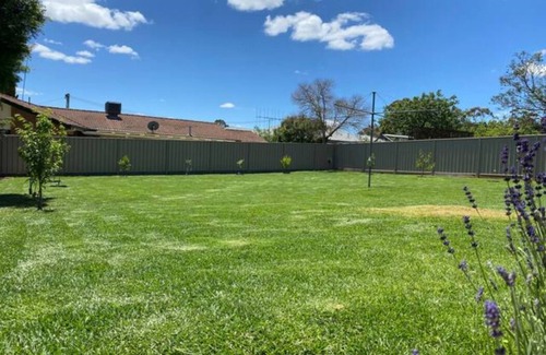 Flora Hill House | Comfortable, Roomy Home with Study and Backyard