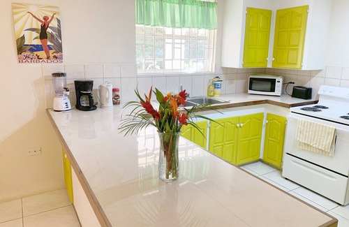 Merlin Bay Villa | Comfortable, safe, breezy apartment set in gated garden, near Holetown & beaches