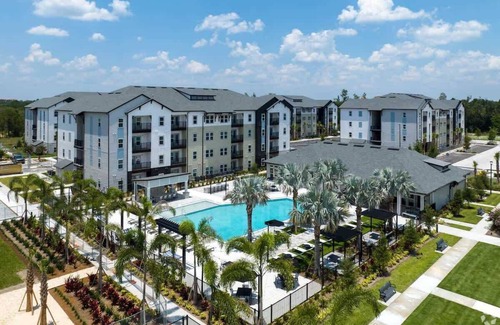 Bay Lake Apartment | Comfy King Bed Apt w/Pool & Gym and Close to Parks