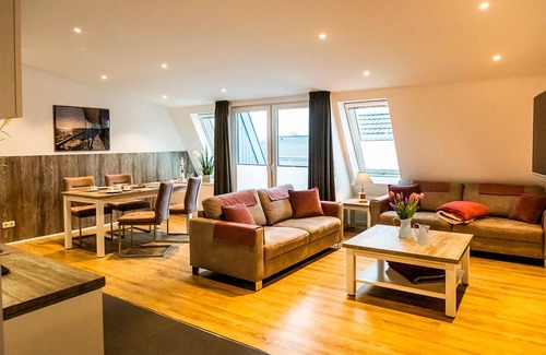 Norddeich Apartment | Completed in early 2017, this 80 sqm penthouse apartment in Norddeich's prime location is certainly one of the most beautiful (vacation) apartments on the entire North Sea coast.
