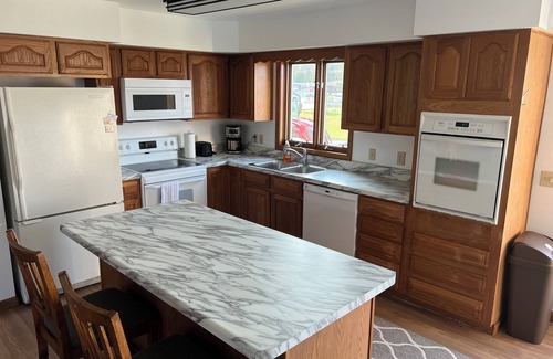 Barbeau Apartment | Completely renovated and steps to the St. Mary's River with optional dock space!