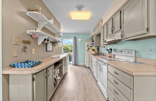 Sea Acres House | Condo located between the ocean and community pool, ideal for small families or couples