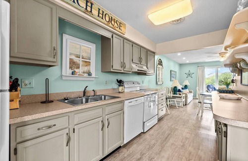 Sea Acres House | Condo located between the ocean and community pool, ideal for small families or couples