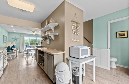 Sea Acres House | Condo located between the ocean and community pool, ideal for small families or couples