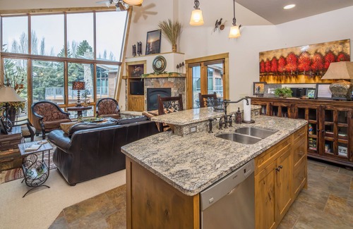 Bigfork Condo | Condo w/fireplace, private patio, A/C - One of a Kind Marina Cay Estates Condo