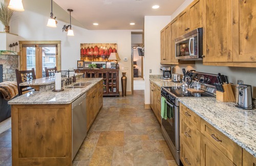 Bigfork Condo | Condo w/fireplace, private patio, A/C - One of a Kind Marina Cay Estates Condo