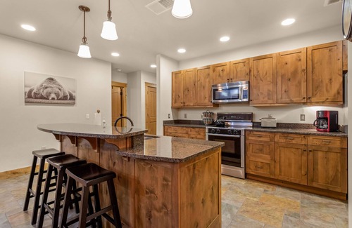 Bigfork Condo | Condo w/stone fireplace, A/C, near GNP - Marina Cay Estates Retreat