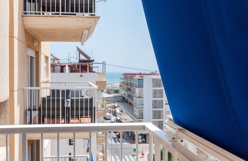 Grao de Gandia Apartment | Condo with charm, a few meters from the beach. A/C and free wifi. Terrace with sea views