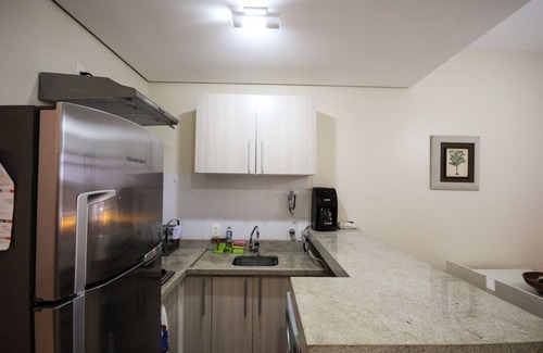 Enseada Apartment | Condominium on the sand in Guarujá SP. Comfort and beautiful photos guaranteed!