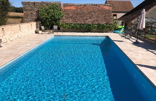 Brigueil-le-Chantre Cottage | Contemporary Barn Conversion by a Medieval Chateau