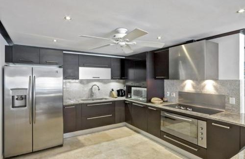 Old Trees Bay Apartment | Coral Cove 7 - Sunset Blue Sky Luxury