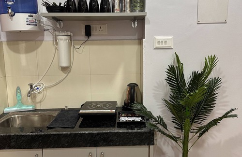 Pune Apartment | Coral : Private Studio near Osho in Koregaon Park. WiFi Smart Tv Kitchenette