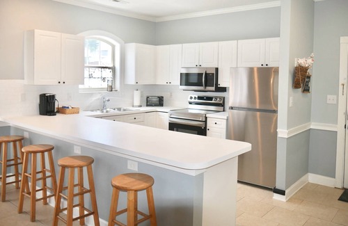 Charlotte Condo | Coralbell Villa - Near UNCC & PNC Pavilion, Pools, Grill, Spacious, 15 Mins to Uptown, King Suite!