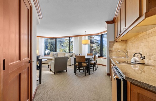 Olympic Valley Condo | Corner king suite with Valley-view, pool, hot tub, golf & other resort amm.
