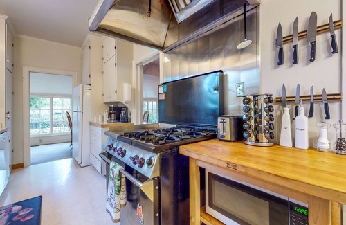 Lakeport House | Corner Lot Home, Carriage House & Enchanting Yard