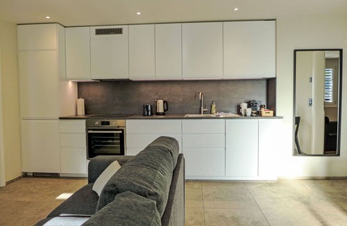 Krattigen Apartment | Cosy apartment for 3 guests with WIFI, TV, terrace, panoramic view and parking