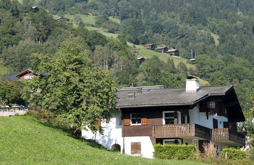 Schluein Apartment | Cosy apartment for 4 guests with TV, balcony, panoramic view and parking