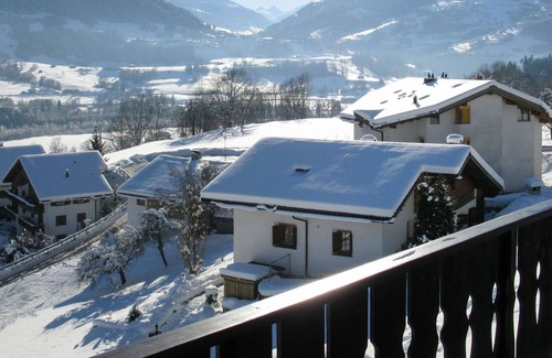 Schluein Apartment | Cosy apartment for 4 guests with TV, balcony, panoramic view and parking