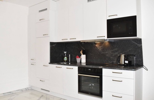 Bigogno Apartment | Cosy apartment for 4 guests with WIFI, pool, A/C, TV, balcony, panoramic view and parking