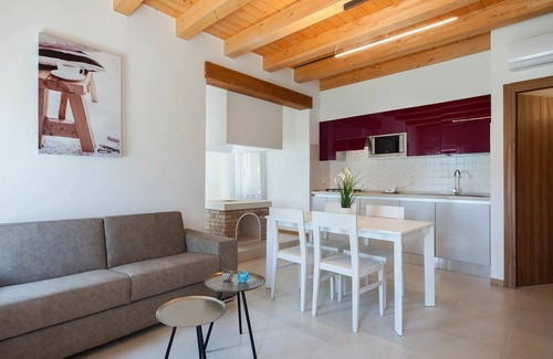Cavallino-Treporti Apartment | Cosy apartment for 4 people with A/C, WIFI, TV, patio and parking