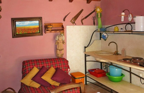Orciatico Villa | Cosy apartment in villa with WIFI, pool, TV, terrace, pets allowed, panoramic view and parking