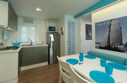 Sirmione House | Cosy apartment in villa for 5 guests with A/C, WIFI, pool, TV, patio and pets allowed
