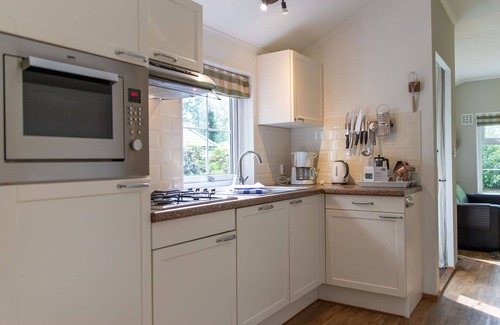 Municipality of Dalfsen House | Cosy apartment in villa for 4 people with WIFI, pool, TV, terrace and parking