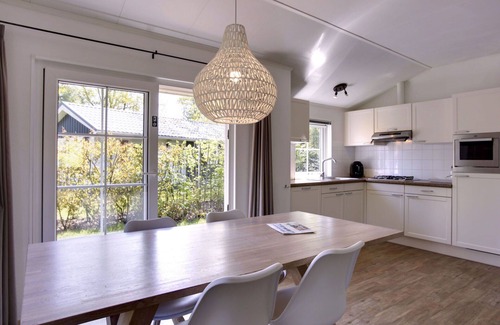 Municipality of Dalfsen House | Cosy apartment in villa for 4 people with WIFI, pool, TV, terrace and parking