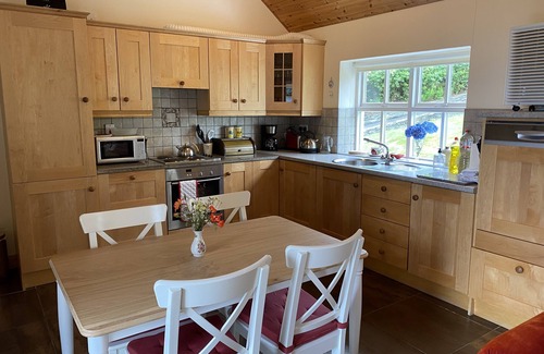 Greencastle Cottage | Cosy & comfortable cottage in private garden with panoramic sea views