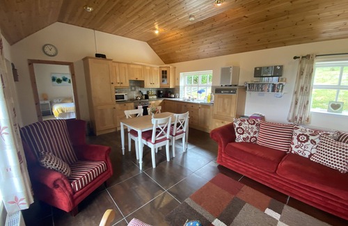 Greencastle Cottage | Cosy & comfortable cottage in private garden with panoramic sea views