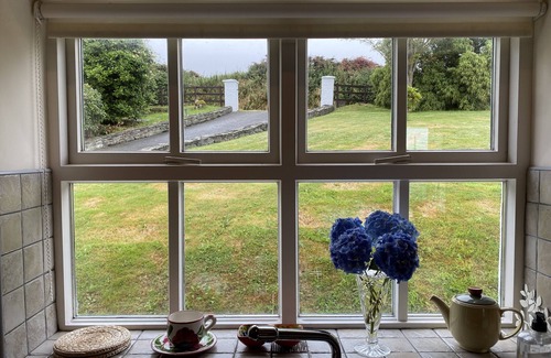 Greencastle Cottage | Cosy & comfortable cottage in private garden with panoramic sea views