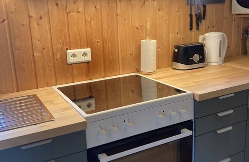 Skorradalshreppur Cottage | Cosy cottage close to natural pearls with hot tub – stars and northern lights!