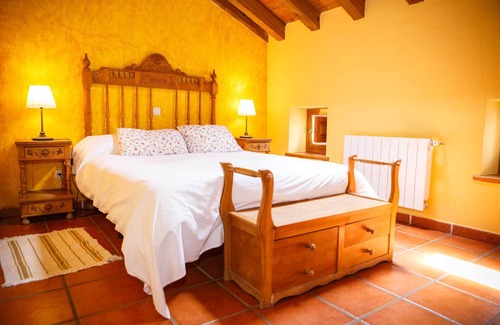 Horcajuelo de la Sierra Ski Chalet | Cottage with wooden ceilings and beams Dormer bedroom and French Fireplace in the Salon
