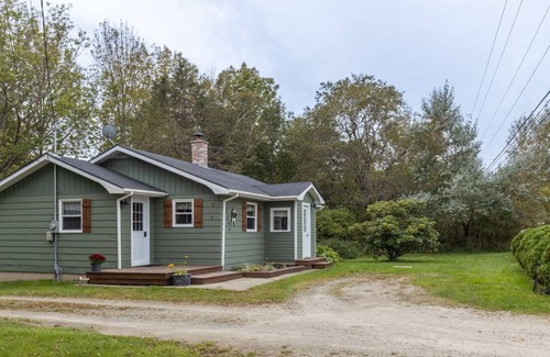Deerfield House | Country home with cozy fireplace