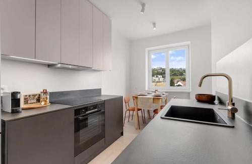 Nove Mesto Apartment | Cozy 1-bedroom apartment in enjoyable Bratislava with WiFi, AC