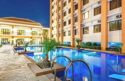 Las Pinas Apartment | Cozy 2-bedroom apartment with WiFi, AC in welcoming Las Piñas