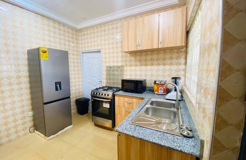 Tokuse Apartment | Cozy 2-bedroom apartment in lovely Mile 11 with AC, WiFi