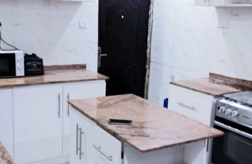 Alimosho Apartment | Cozy 2-bedroom apartment in a pleasant area in Abesan Lagos with AC, WiFi,Solar