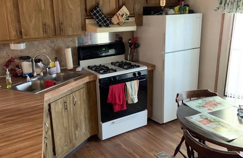 Irons Cottage | Cozy 2-bedroom cottage just 10 minutes from Huron-Manistee National Forest