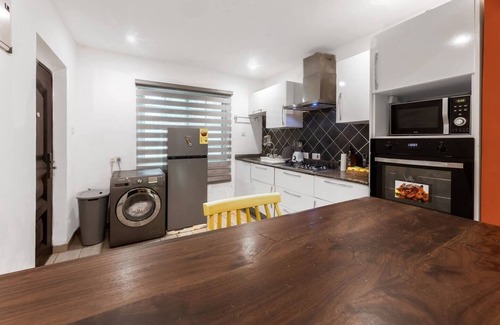 Santeo House | Cozy 2-bedroom townhome with AC and WiFi in brilliant Adenta