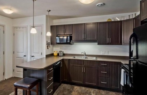 Steinbach Condo | Cozy 2nd floor condo unit with balcony near downtown