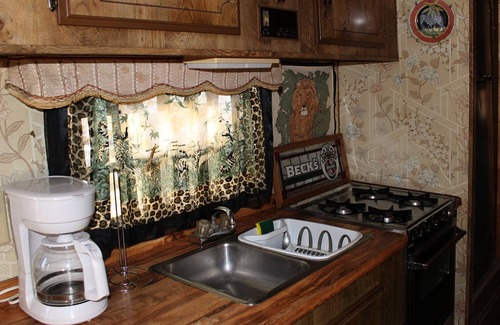 Bombay Beach House | Cozy 80s Safari Style RV in Tranquil Bombay Beach with AC