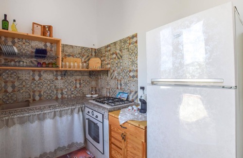 Caminia Apartment | Cozy and charming apartment with garden and sea view.