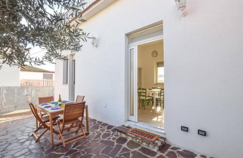 Caminia Apartment | Cozy and charming apartment with garden and sea view.